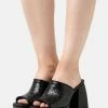 Even&Odd Heeled Mules - Black 1 Even&Odd Heeled Mules - Black -Even&Odd Sales Store beed445f5aaa4e55a454e75ebb019932